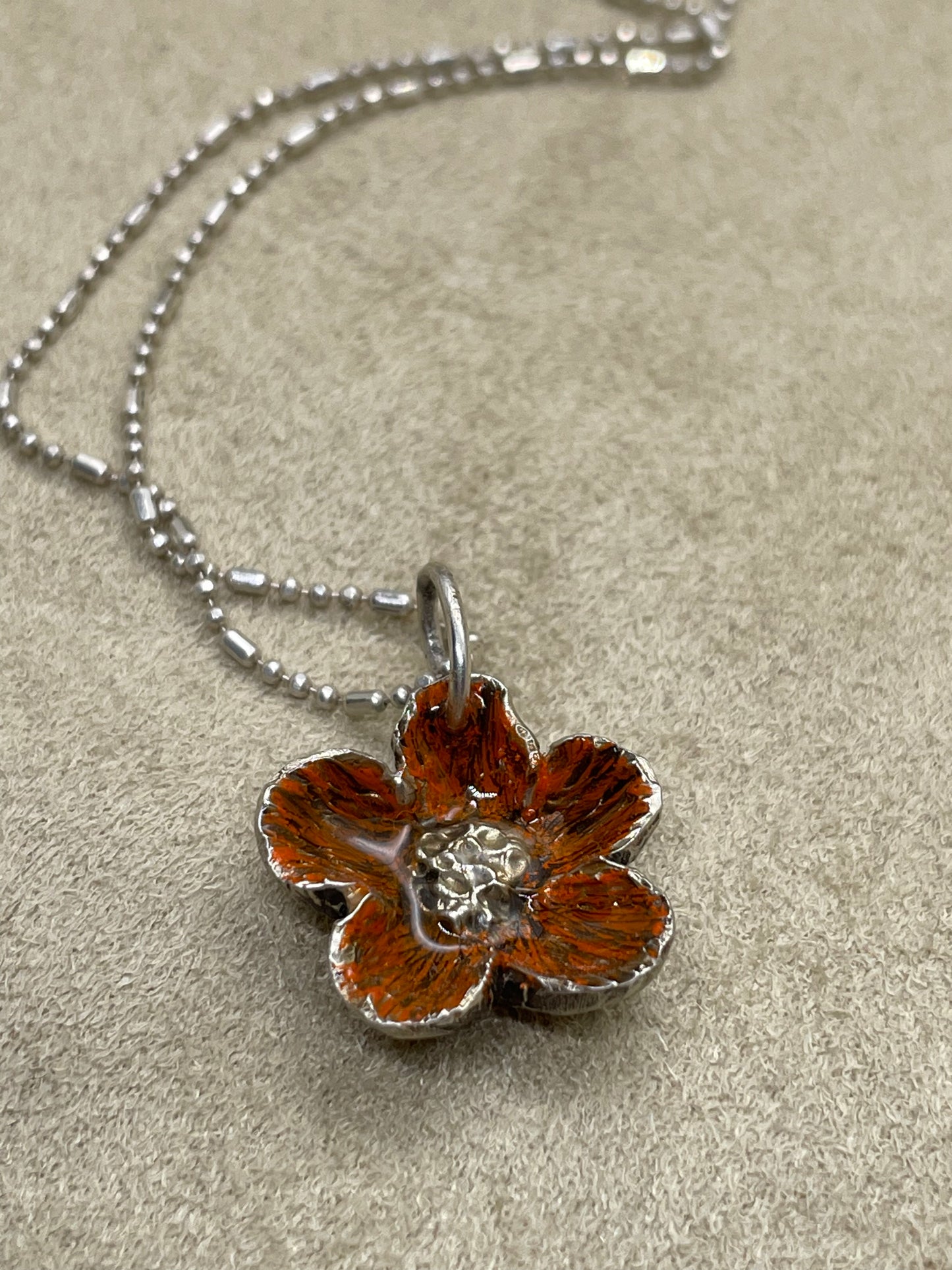 dije flor